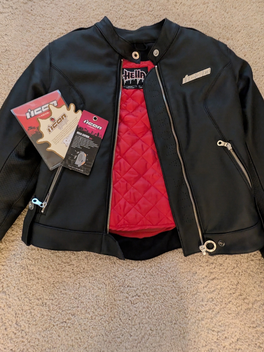 Icon Black Leather Motorcycle Jacket with Red Quilted Lining